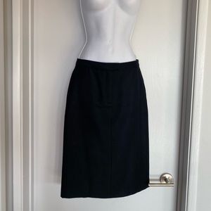 CoSTUME NATIONAL vintage black wool skirt. Size 2. Back pockets, front zip